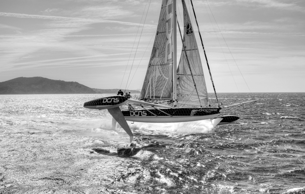 Aerial photo shoot of lâ€™HydroptÃ¨re DCNS, Alain ThÃ©bault and his crew (Yves Parlier, Jean le Cam, Jacques Vincent, Luc Alphand)  during the first series of trials on the Med before trying to beat the Pacific crossing record between Los Angeles and Hono